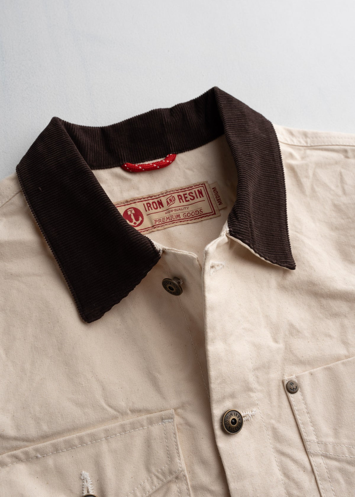 Men’s cotton canvas jacket with boxy fit and corduroy collar, dual chest pockets and welt hand pockets, durable workwear outerwear with classic utility design