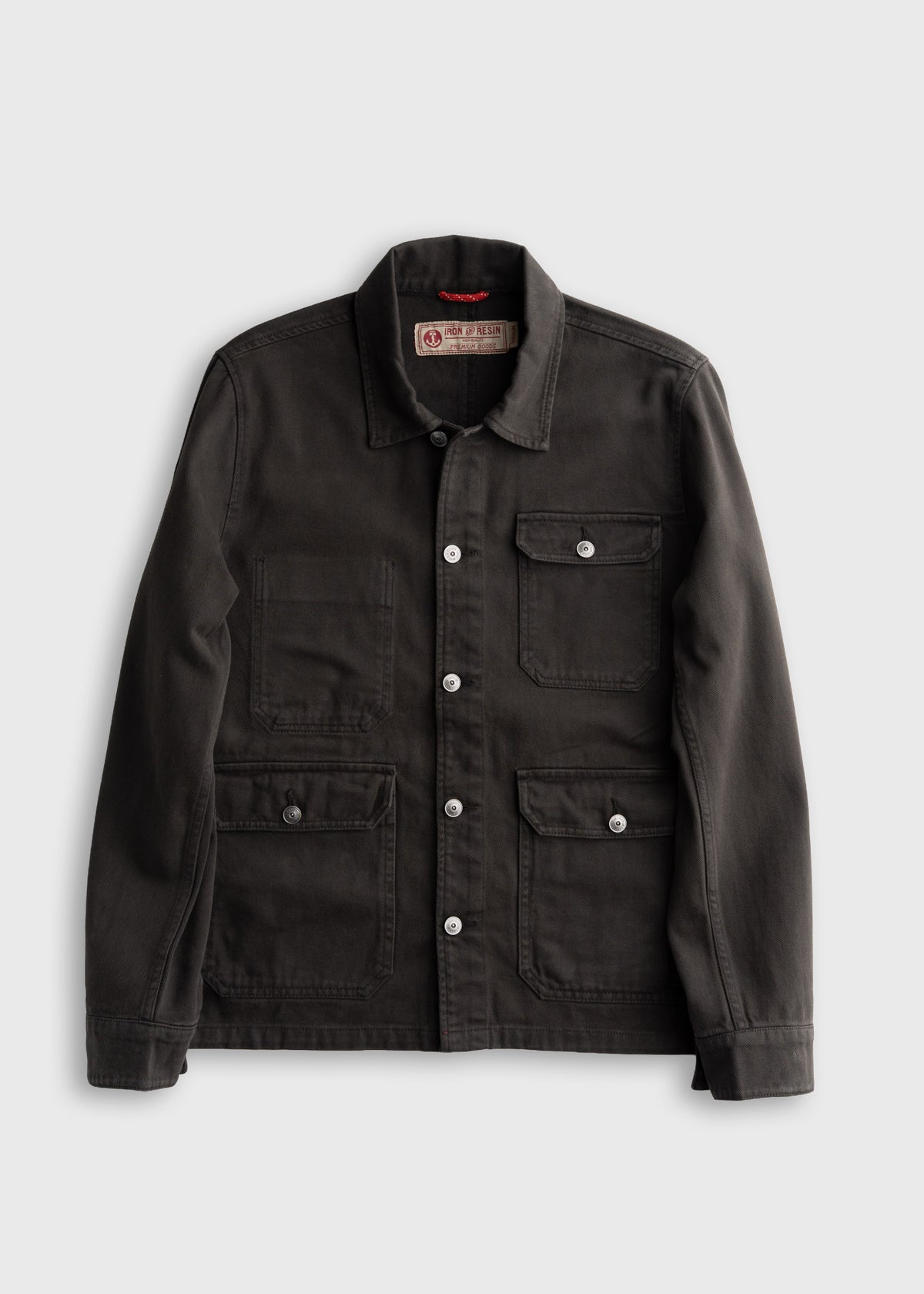 Men’s peach bull denim jacket with shank button closure and three front pockets, durable cotton workwear outerwear with mechanic style interior pockets and classic utility design