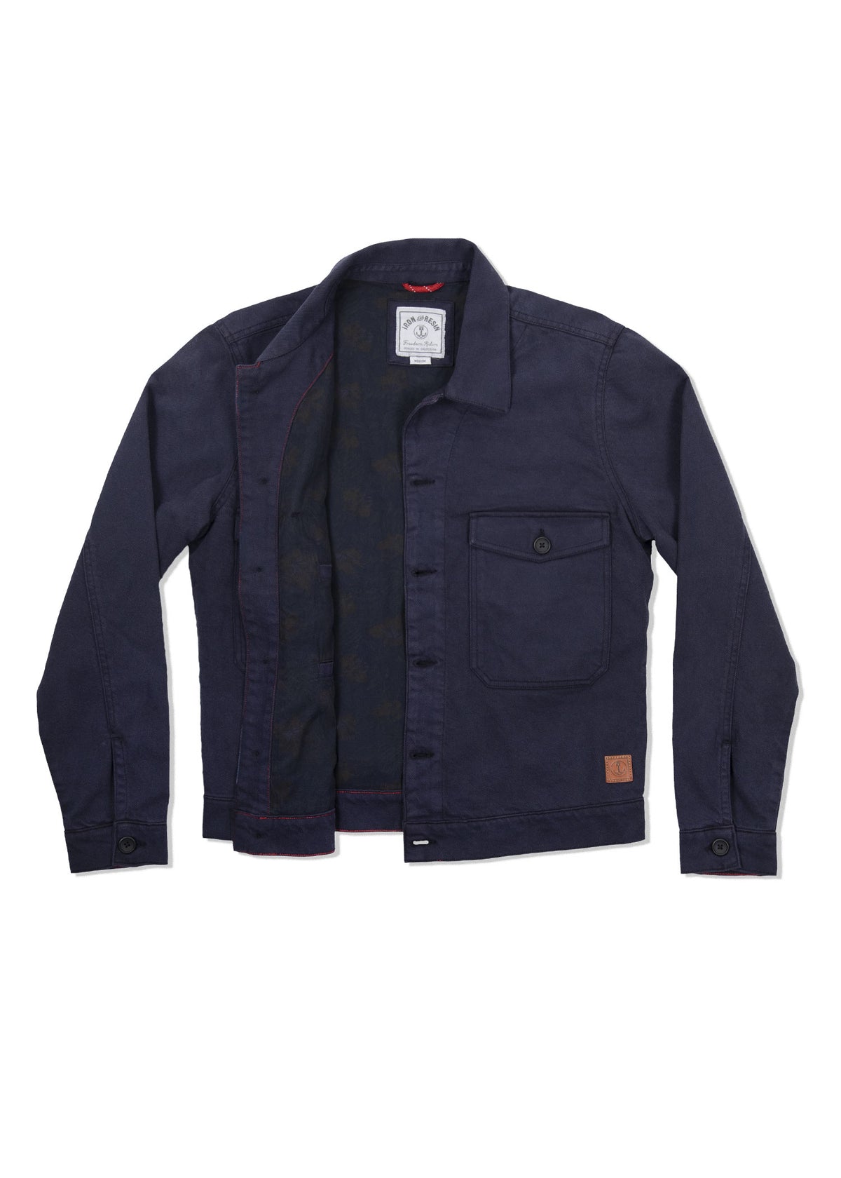 Navy blue jacket with open front, single chest pocket, and visible inner label. Simple design with buttoned cuffs and collar.