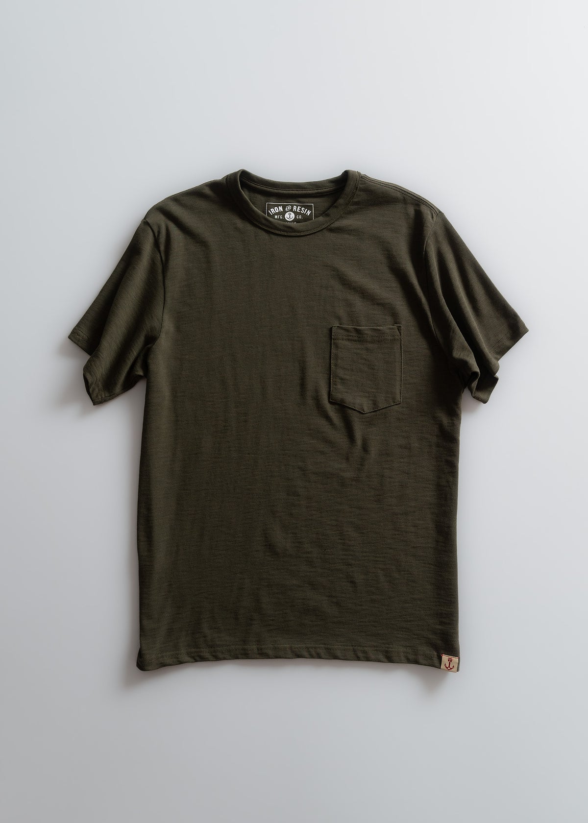 Green men’s cotton slub short sleeve shirt with garment dyed finish, single chest pocket and relaxed fit, lightweight everyday workwear staple for warm weather