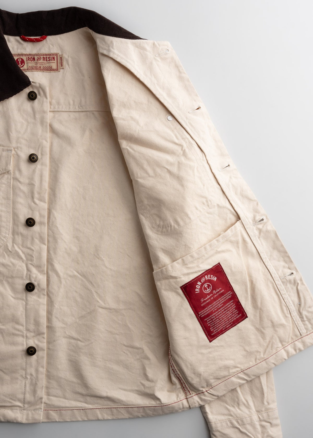 Men’s cotton canvas jacket with boxy fit and corduroy collar, dual chest pockets and welt hand pockets, durable workwear outerwear with classic utility design