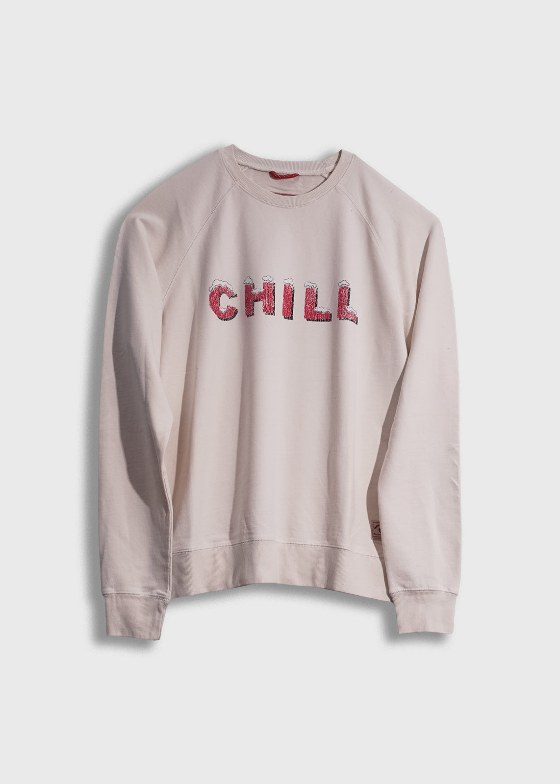Cream sweatshirt with "CHILL" in red letters on front, displayed against a white background. Casual and relaxed style.