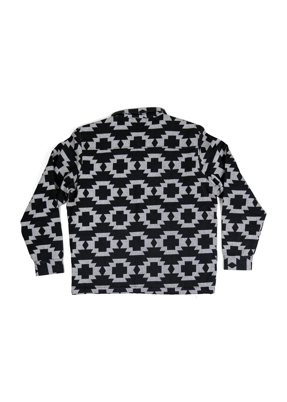 Black and white geometric pattern shirt with long sleeves, featuring bold, symmetrical designs. Back view on a white background.
