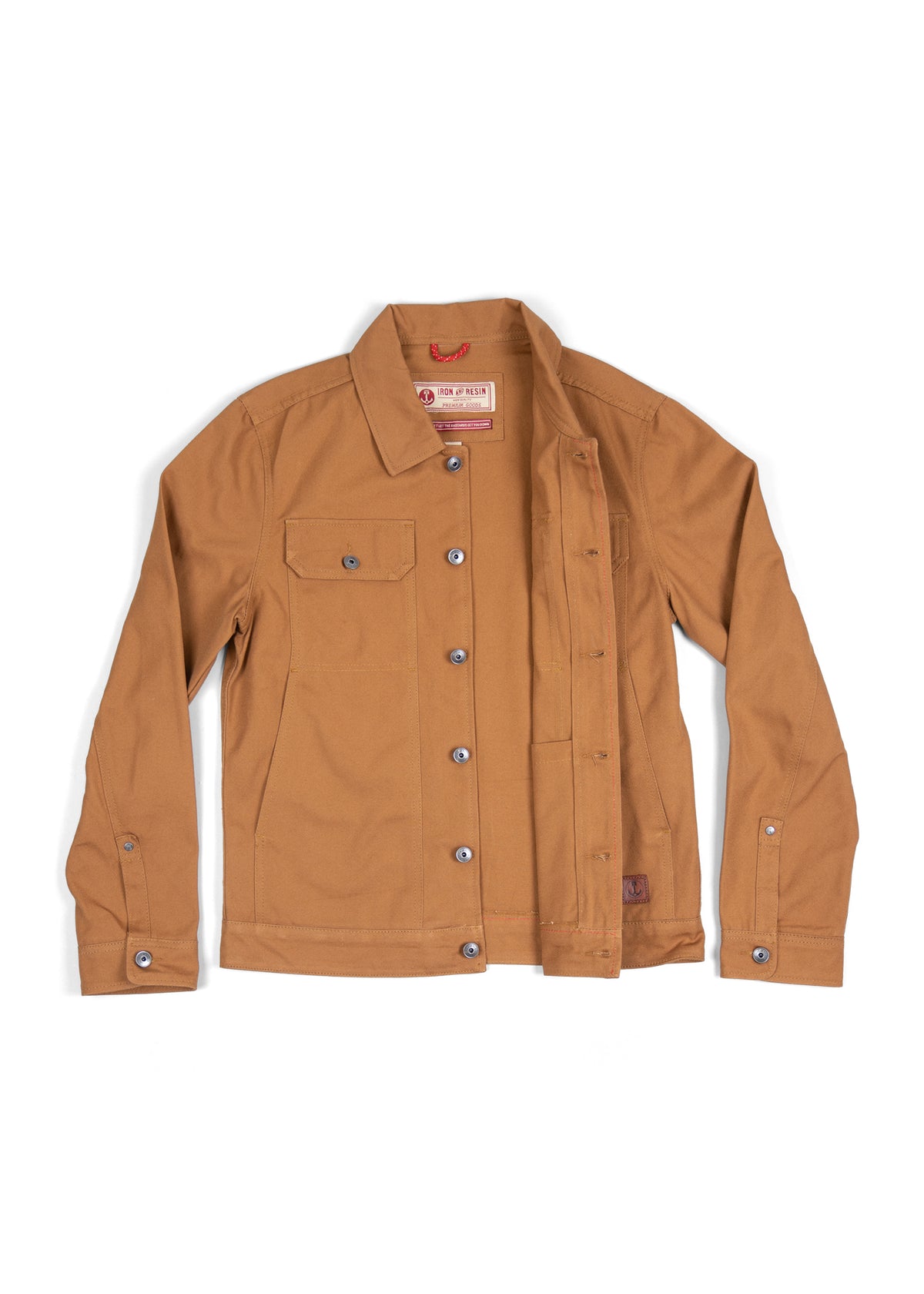 Brown canvas jacket with button closure and chest pocket, laid flat. Iron and Resin label visible inside the collar.