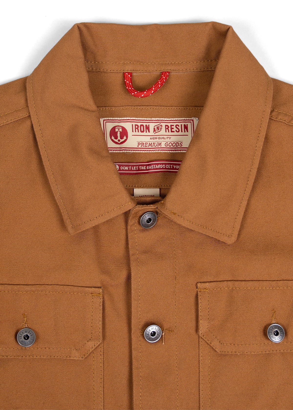 Brown button-up shirt with two chest pockets. The label reads "Iron and Resin Premium Goods" with a red anchor logo.