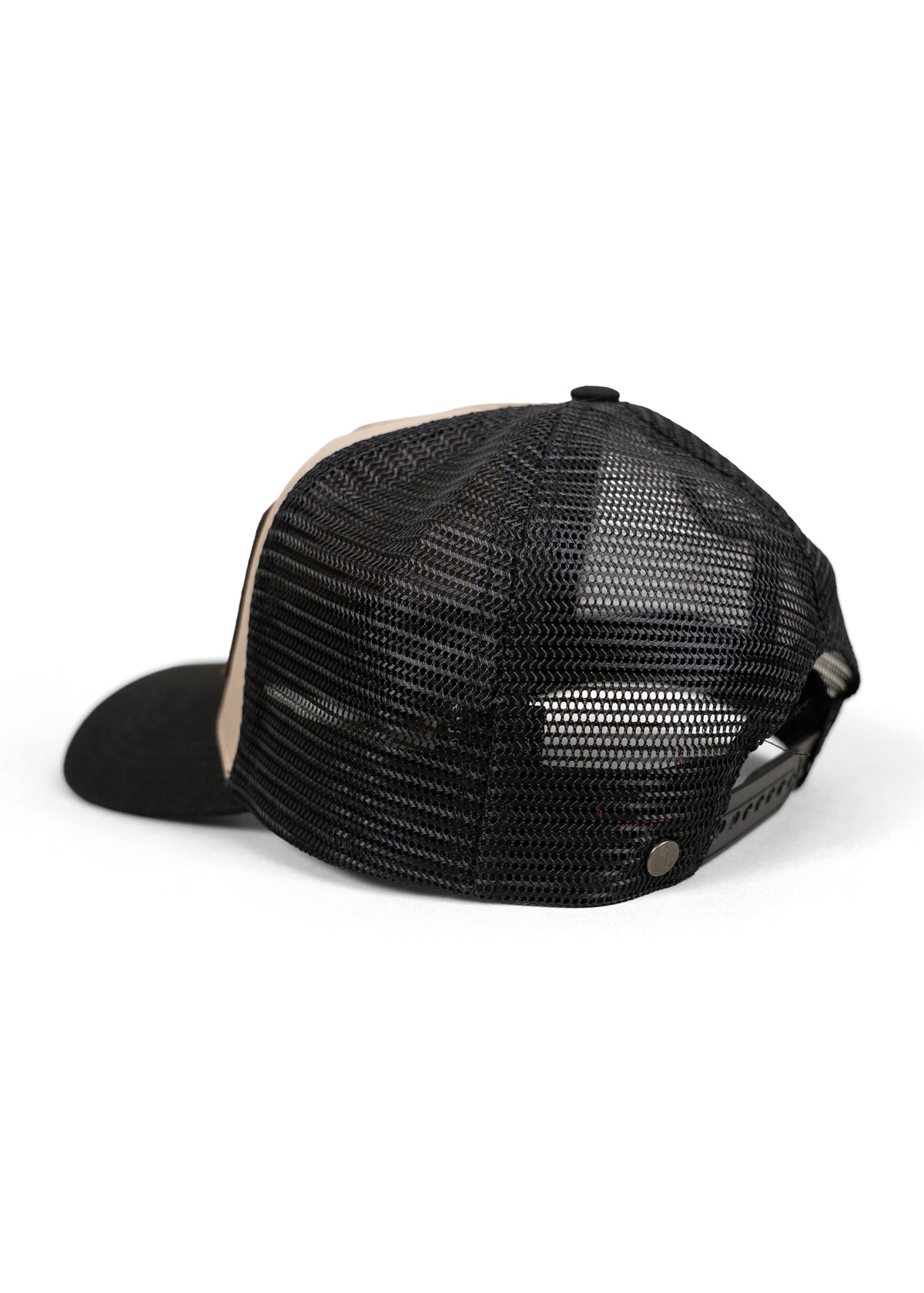 Black mesh trucker hat with adjustable snapback, beige front panel, and curved brim, viewed from the back on white background.