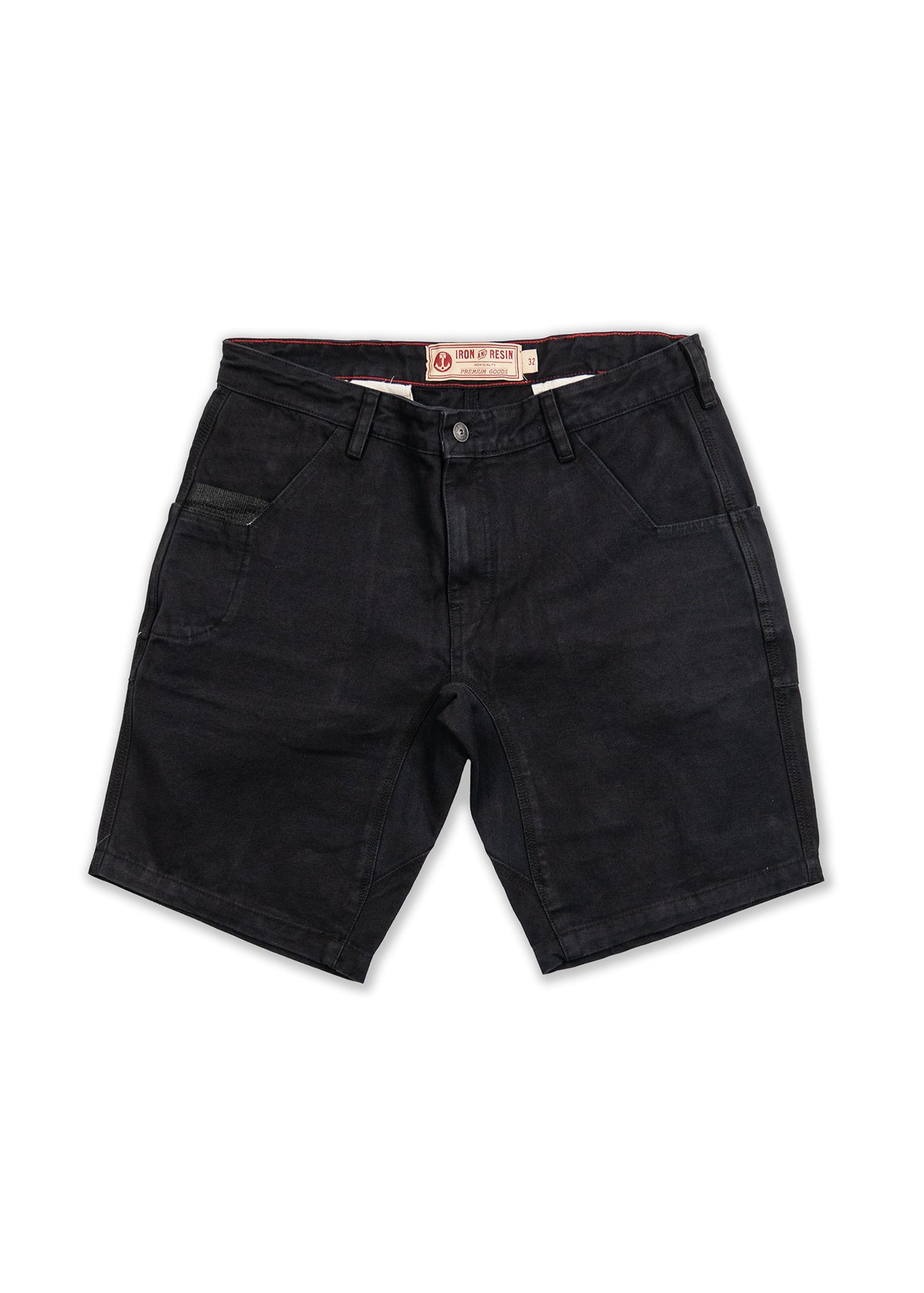 Black denim shorts with front pockets and belt loops, featuring an Iron & Resin label on the waistband, laid flat on a white background.
