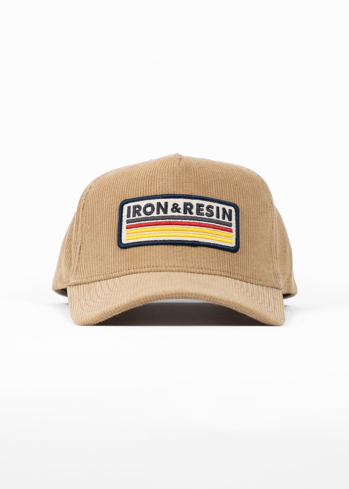 Tan cap with "Iron & Resin" patch featuring red, yellow, and blue stripes, displayed against a plain white background.