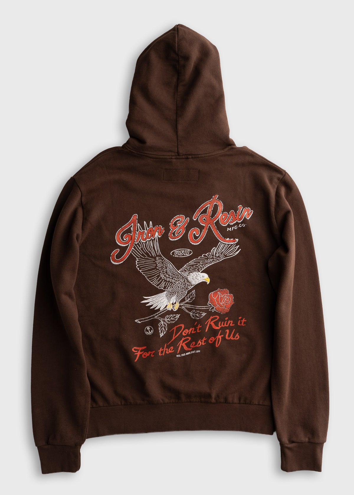 Brown hoodie with "Iron & Resin" logo, eagle graphic, and "Don't Ruin it for the Rest of Us" text in red on the back.