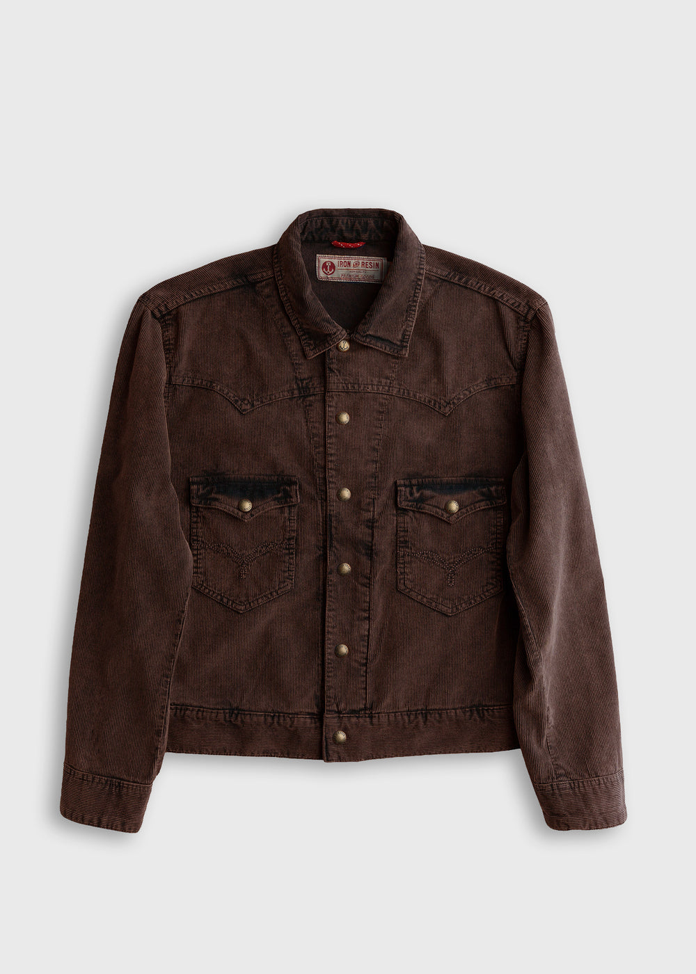 Brown corduroy jacket with button closure and two front pockets on a plain background, showcasing casual style and texture.