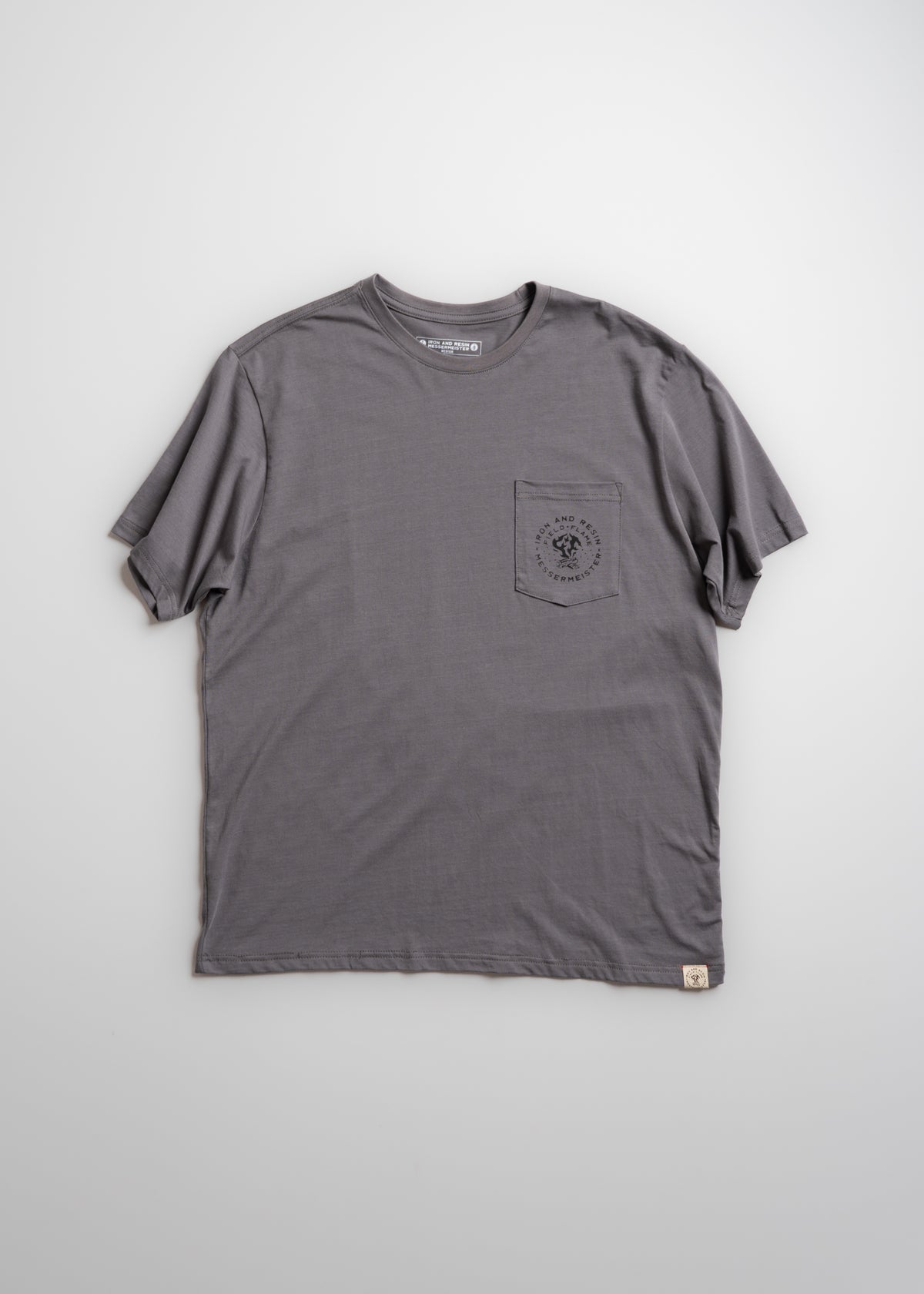 Gray T-shirt with a round neck and a small pocket on the left chest, featuring subtle text and logo design.