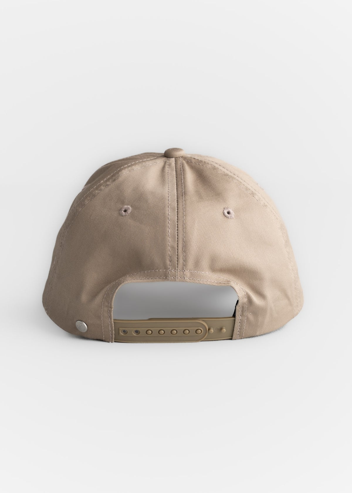 Close up of adjustable strap on hat, showcasing fit adjustment and rear closure detail