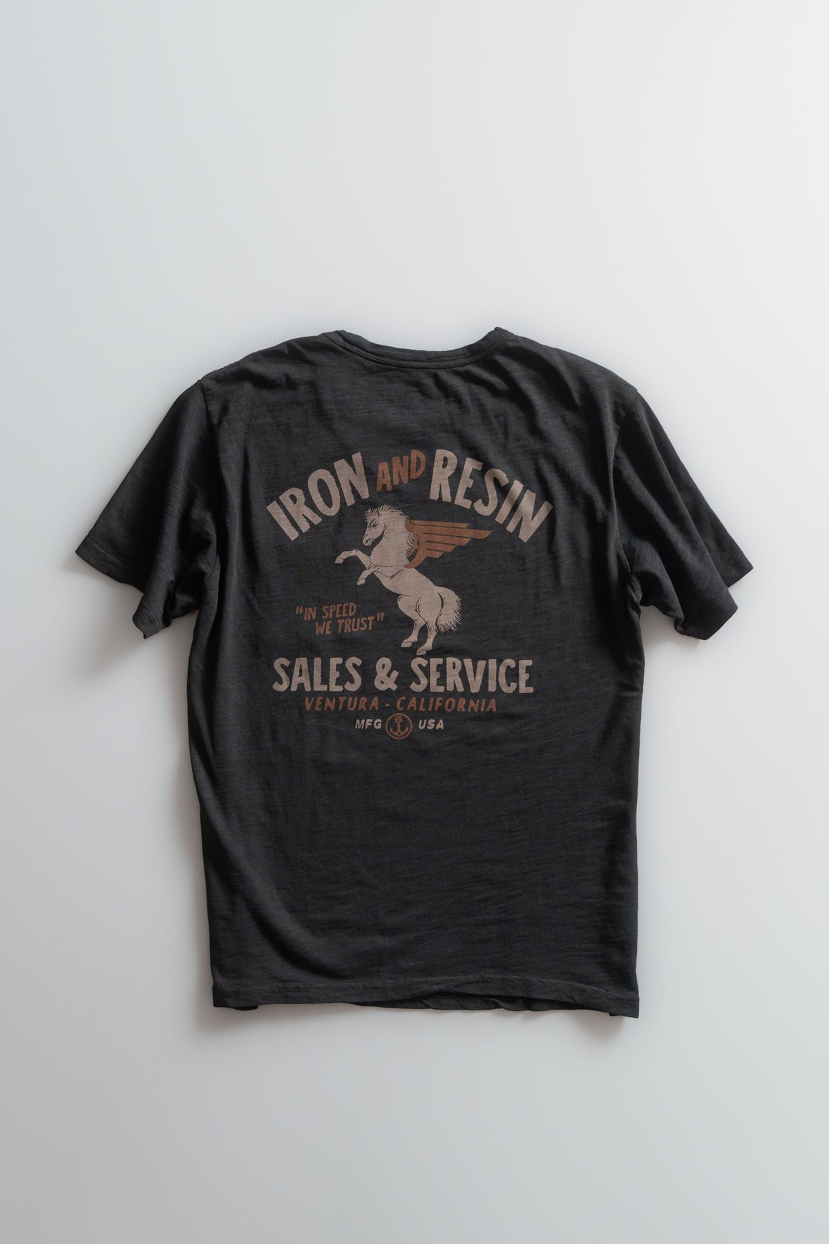 Black T-shirt with "Iron and Resin" logo, featuring a winged horse. Text reads "Sales & Service, Ventura, California, USA."