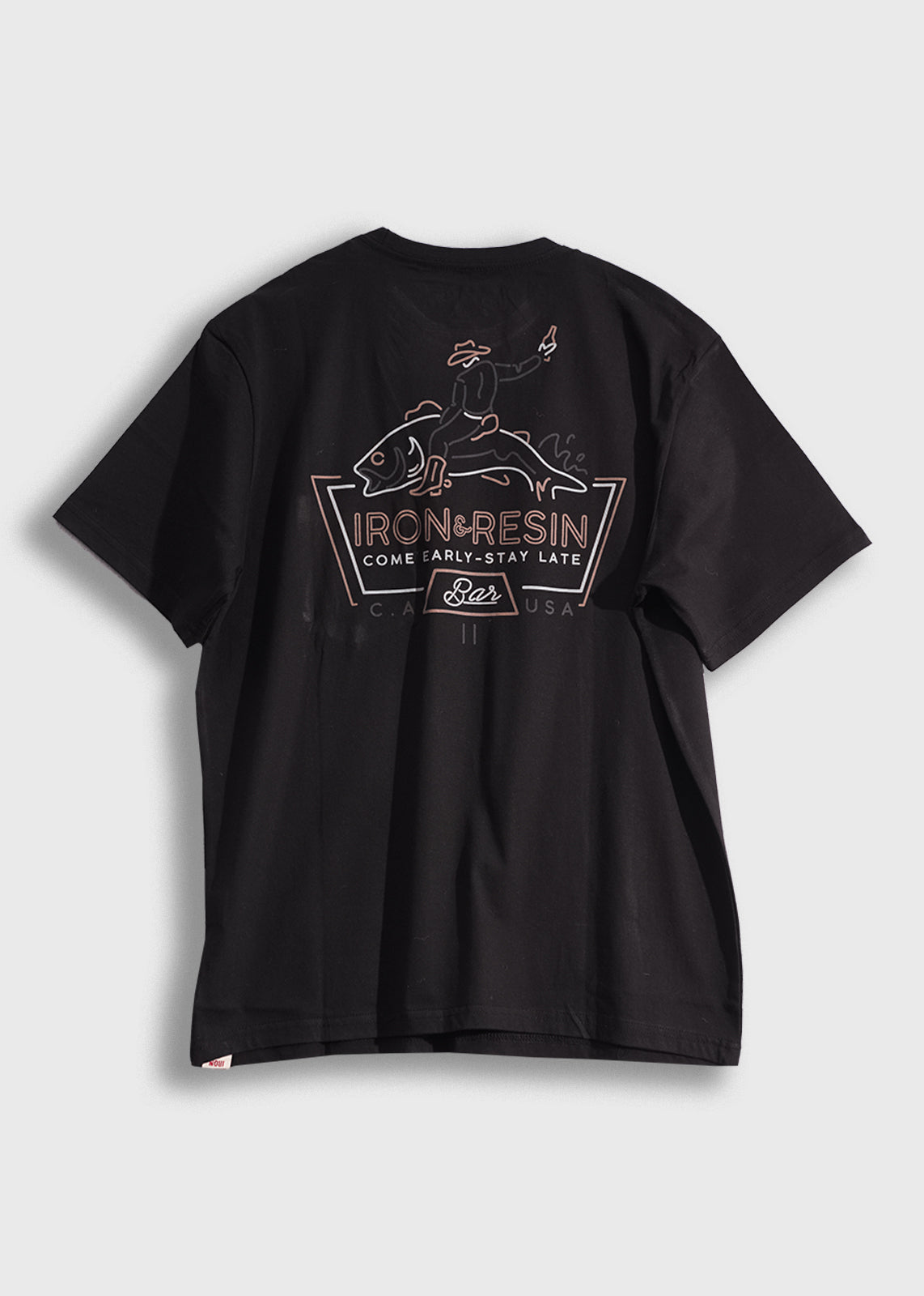 Black T-shirt with "Iron & Resin" logo, featuring a graphic of a cowboy riding a fish, and the slogan "Come Early-Stay Late."