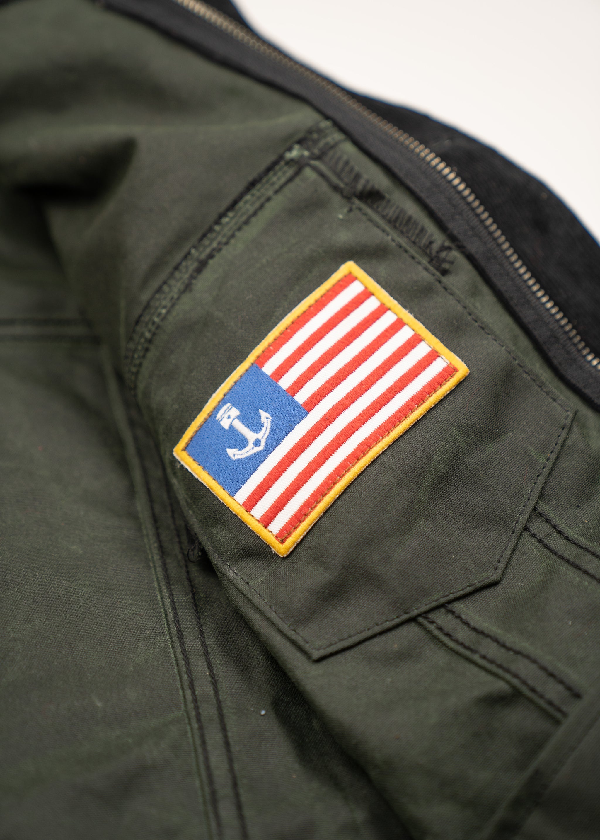 Racing Green Rambler Jacket Iron Resin
