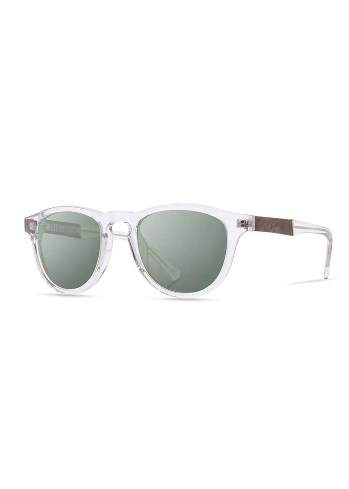 Clear-framed sunglasses with round green lenses and wooden temple accents, set against a white background.