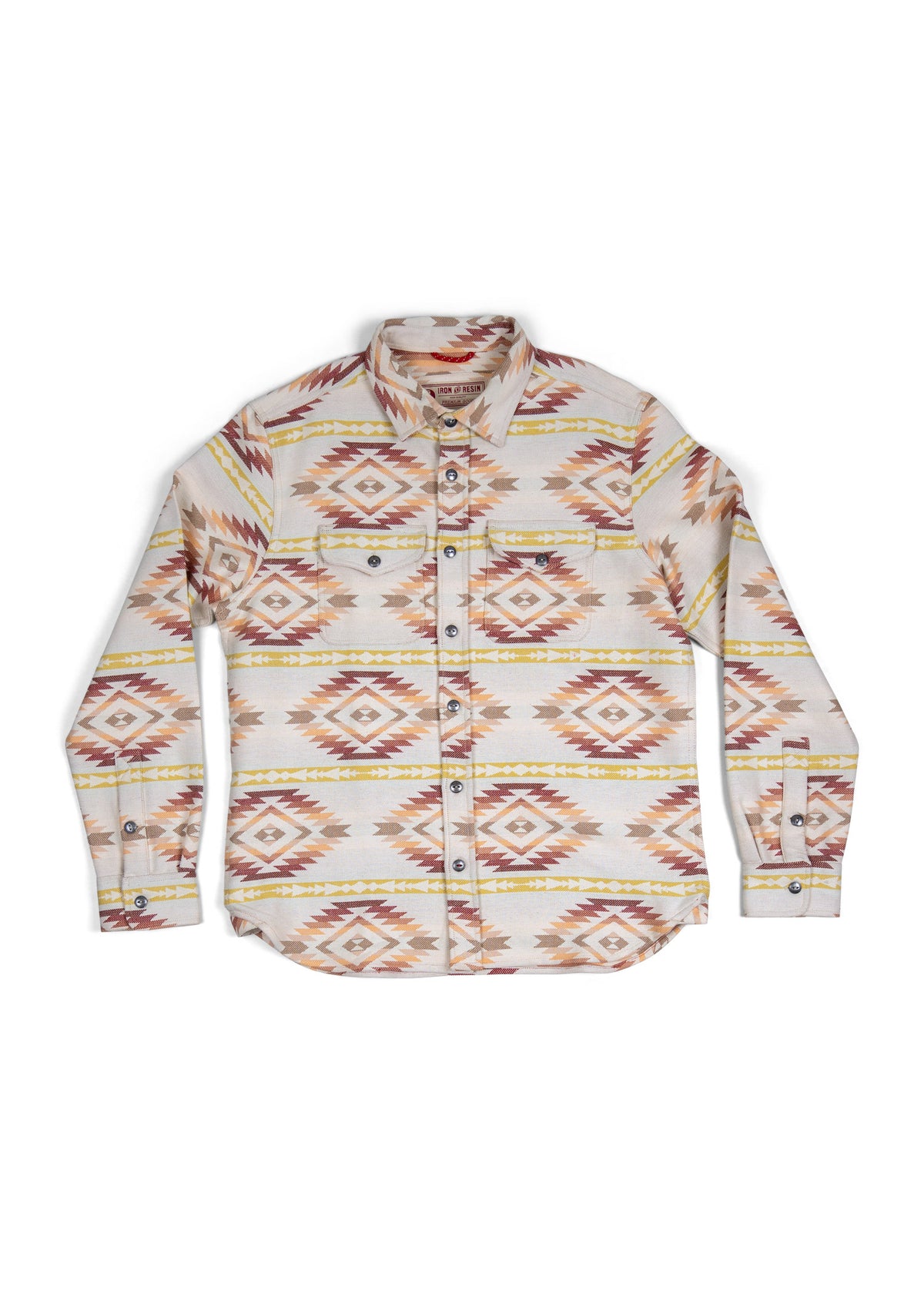 Patterned long-sleeve shirt with geometric designs in earthy tones, featuring a button-up front and two chest pockets.