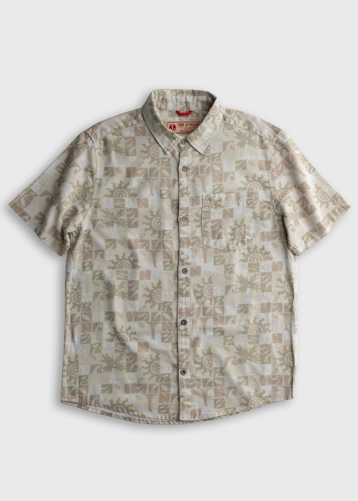 Beige short-sleeve button-up shirt with a subtle geometric pattern, featuring a front pocket and a collar, laid flat on white.